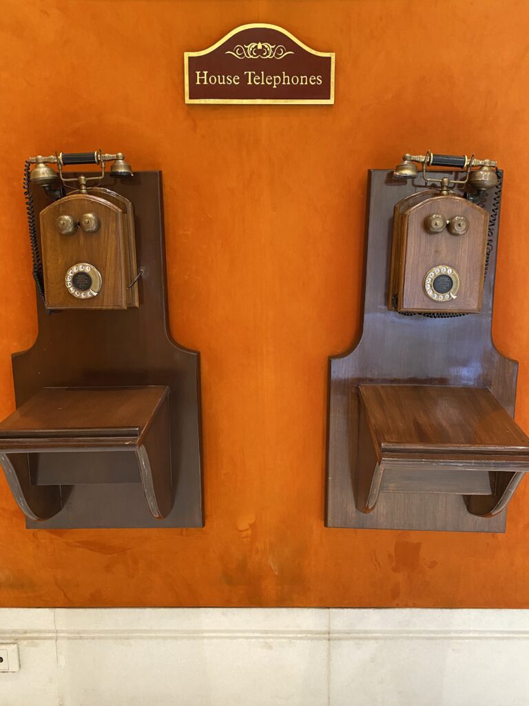 Old fashioned rotary house phones in lobby of  ITC Rajputana Hotel in Jaipur, India 