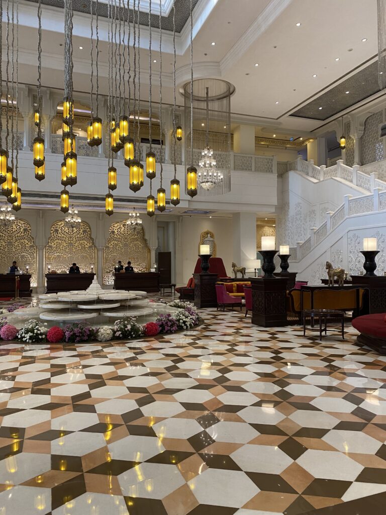 View of hotel guest services in lobby of ITC Rajputana Hotel Jaipur, India